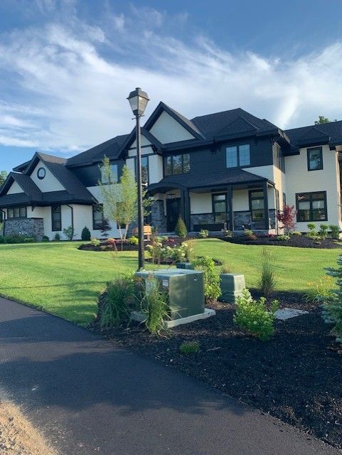 Wooden floor with red heating tubes installed, prepared for finishing.