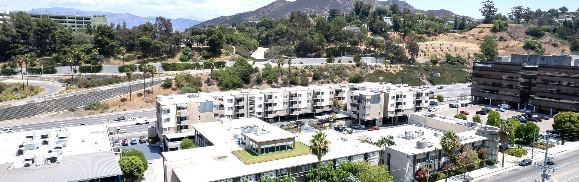 An aerial view of a city with a lot of buildings and trees