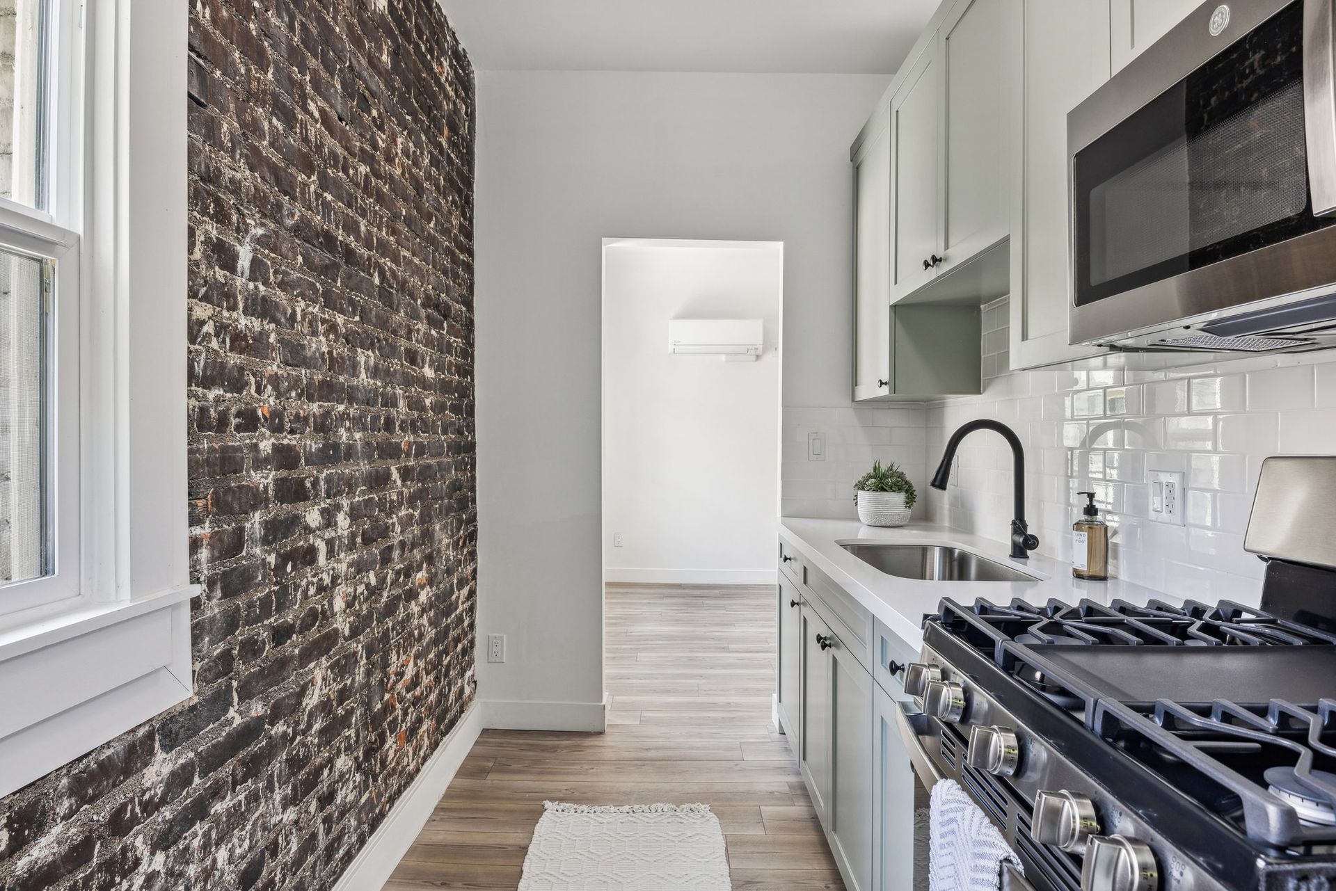 Image of Ansley's gorgeous and bright kitchen with appliances