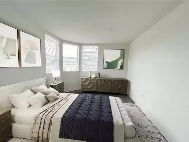 The Centennial Apartments' well-lit and spacious living area