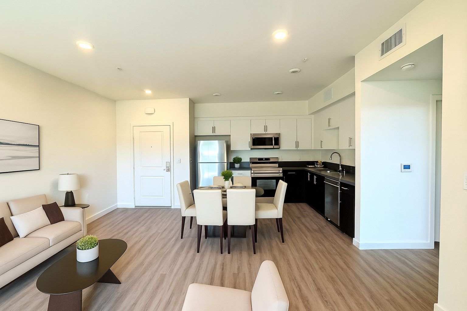 Theater with 8 leather wrapped and cushioned couch and screen