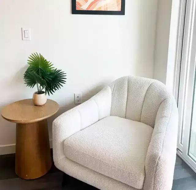 The Centennial Apartments' sunlit interiors highlight the beauty of furniture