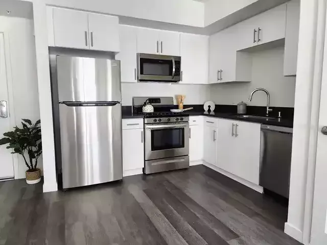 The fully equipped kitchen at The Centennial Apartments in Toluca Lake, California
