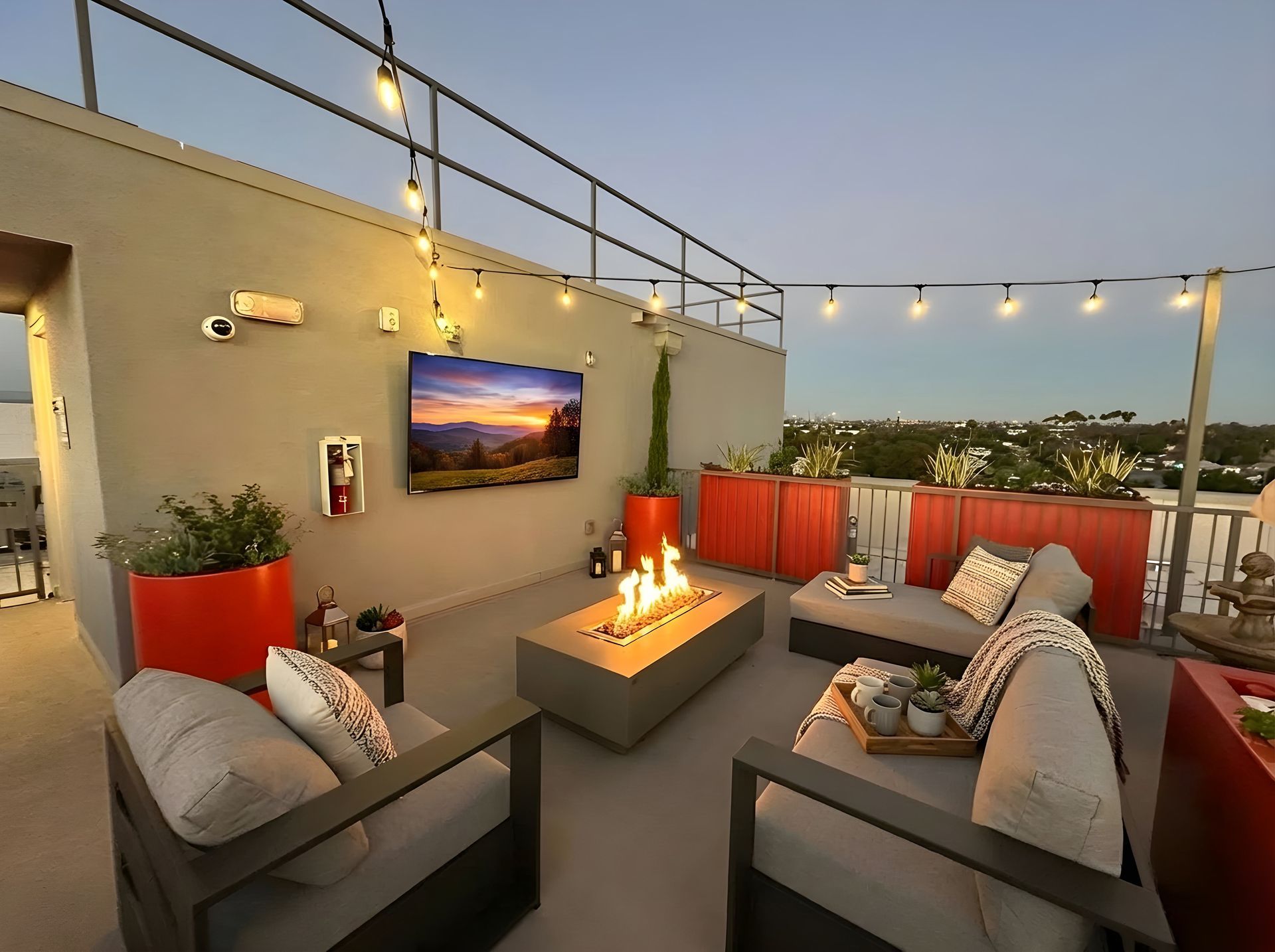 photo of The Centennial's indoor amenity, showing a spacious recreation room with a lounge, game and a pool table