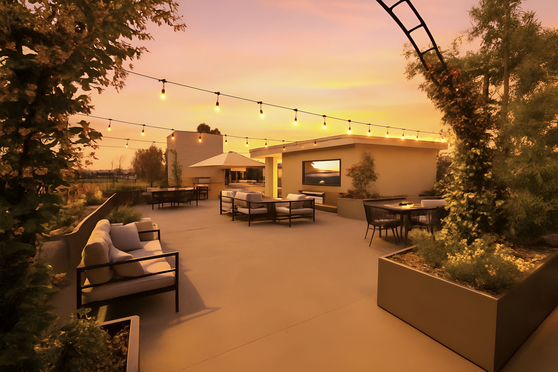 Photo showing an the Mix Luxury Apartment rooftop that features outdoor barbecue, outdoor tables and TV