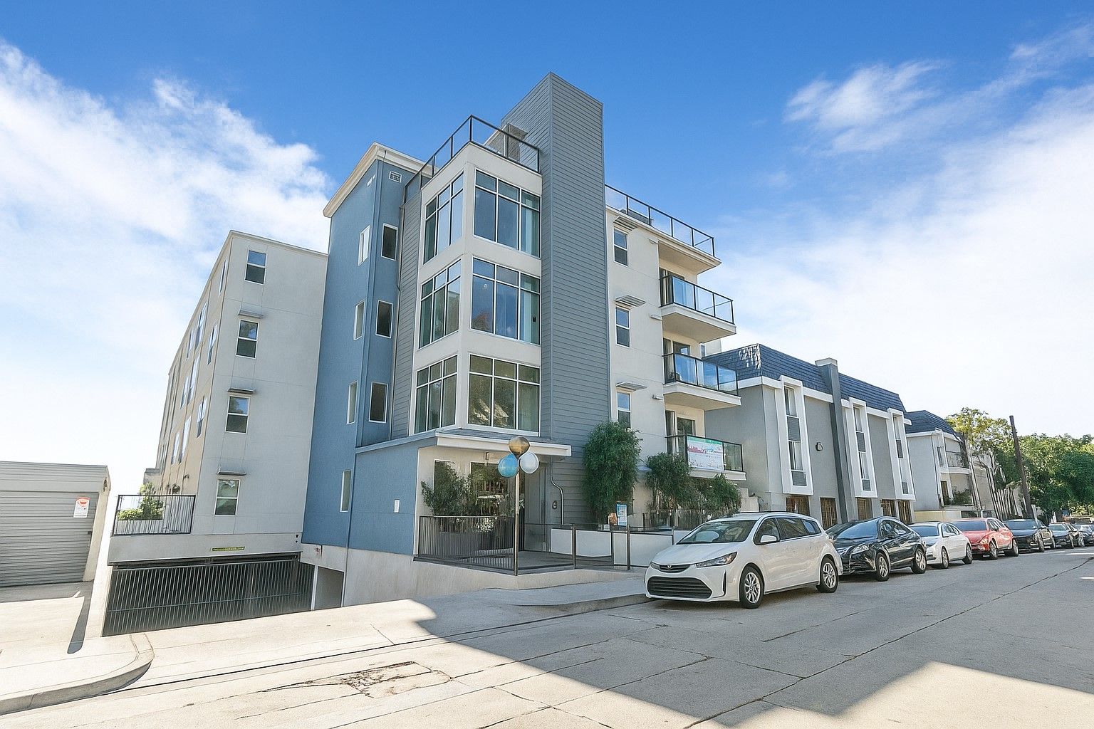 The imposing building facade of the Mix Luxury Apartments