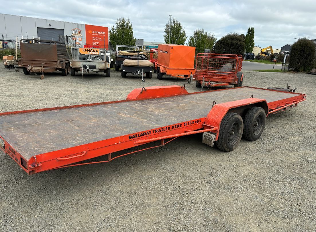 A Bunce of Silver Trailers Are Aligned  Near a Parking Lot — Ballarat Trailer Hire in Alfredton, VIC