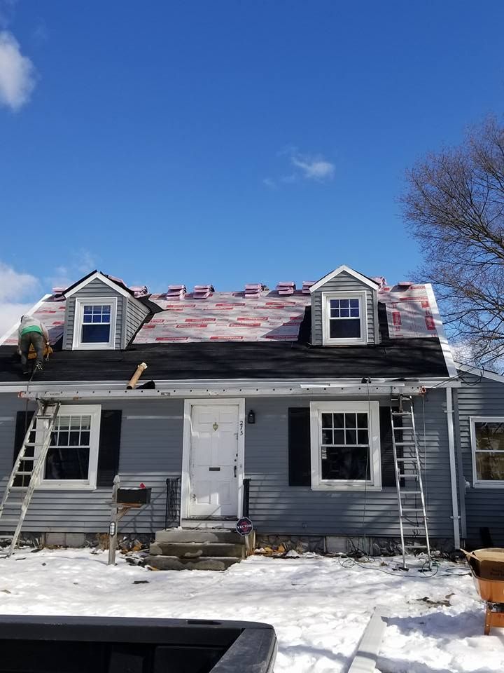 House with Windows — Springfield, MA — Home City Roofing