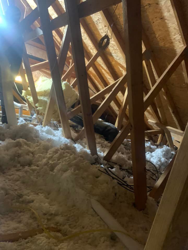 There is a lot of insulation in the attic of a house under construction.