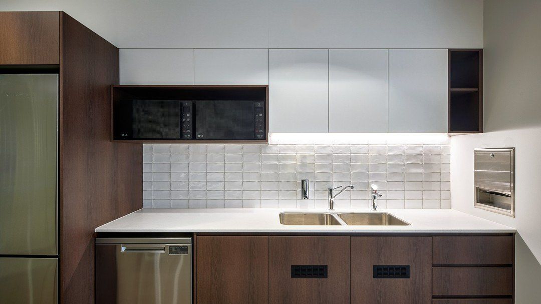 Modern Kitchen With Brown And White Cabinets — Zeal Interiors in South Grafton, NSW