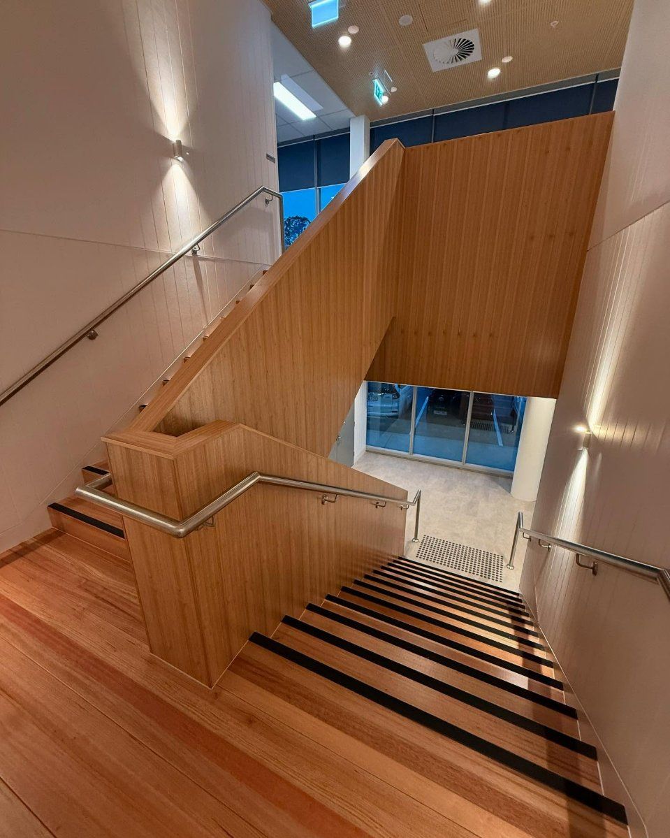 Wooden Staircase With Metal Handrails — Zeal Interiors in South Grafton, NSW