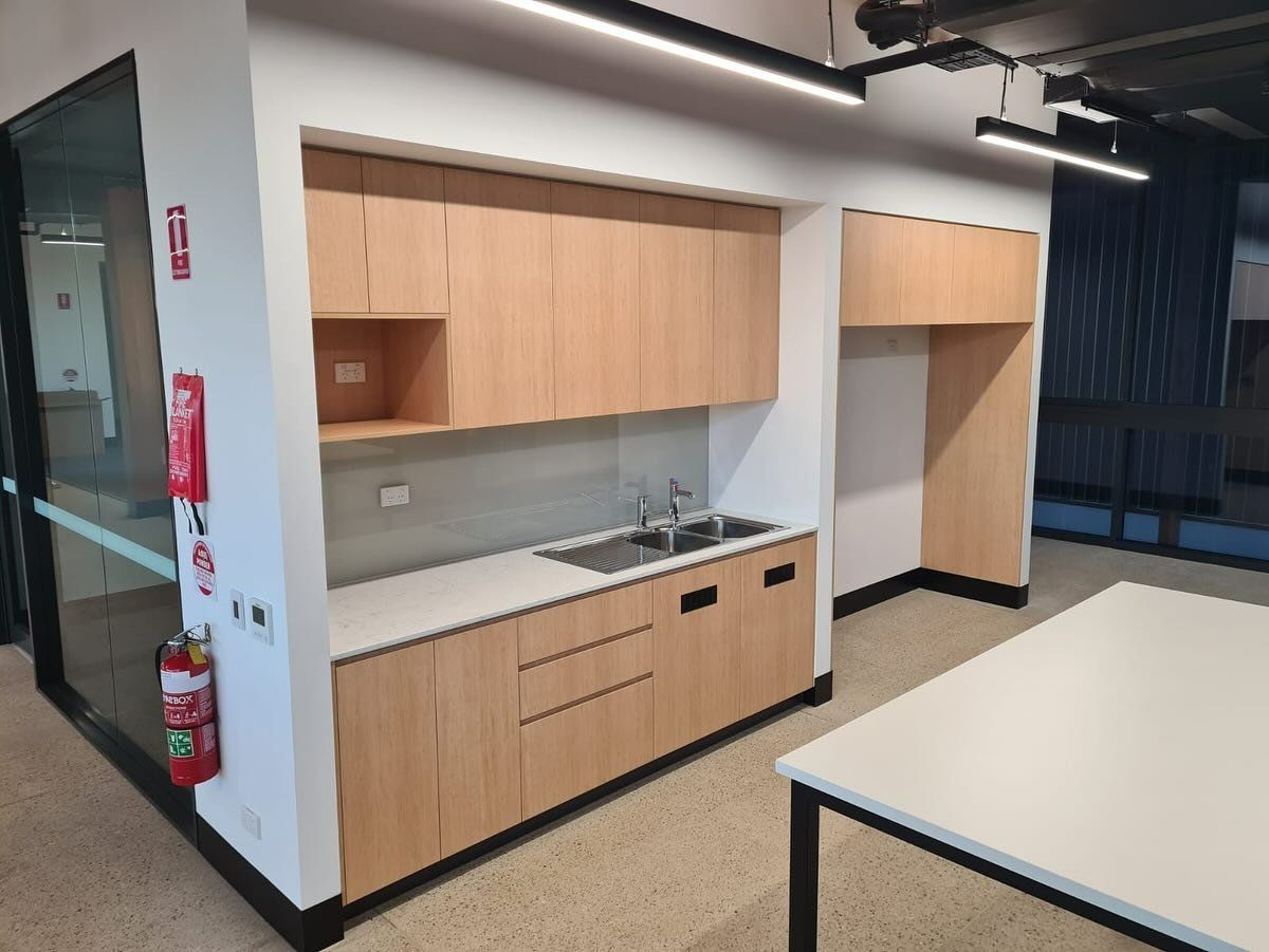 Office Kitchenette With Wood Cabinets, Sink — Zeal Interiors in South Grafton, NSW