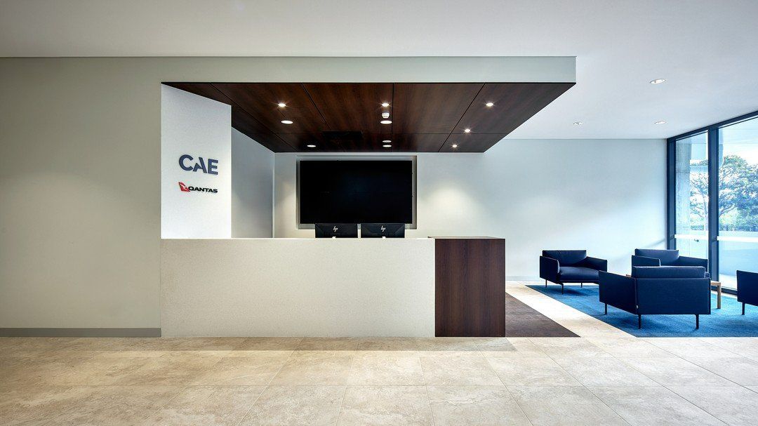 Reception Area With A White Counter, Wooden Accents — Zeal Interiors in South Grafton, NSW
