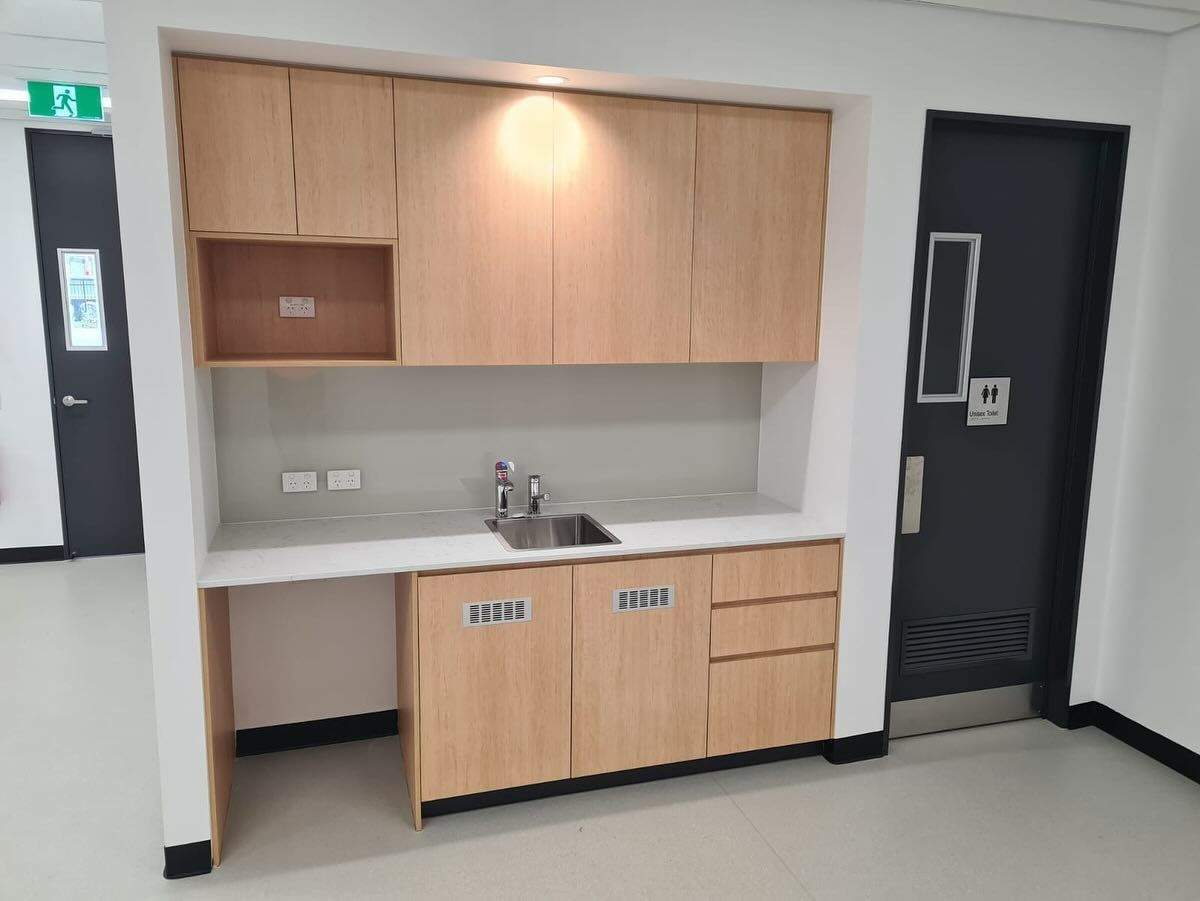 Built-in Light Wood Cabinets And Sink In A Neutral-color — Zeal Interiors in South Grafton, NSW