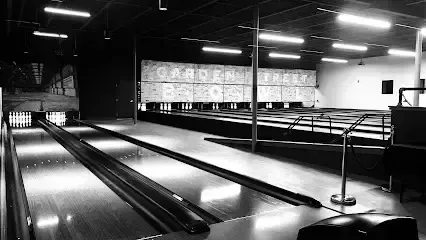 Chimney sweep portland maine-Black and white photo of a bowling alley with multiple lanes, pins, and overhead lighting.