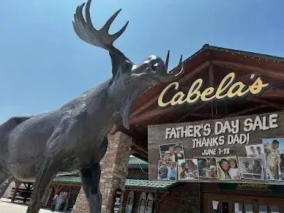 Chimney sweep portland maine - Large moose statue in front of a Cabela's store with a Father's Day Sale banner.