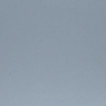 A close up of a light blue paper texture.