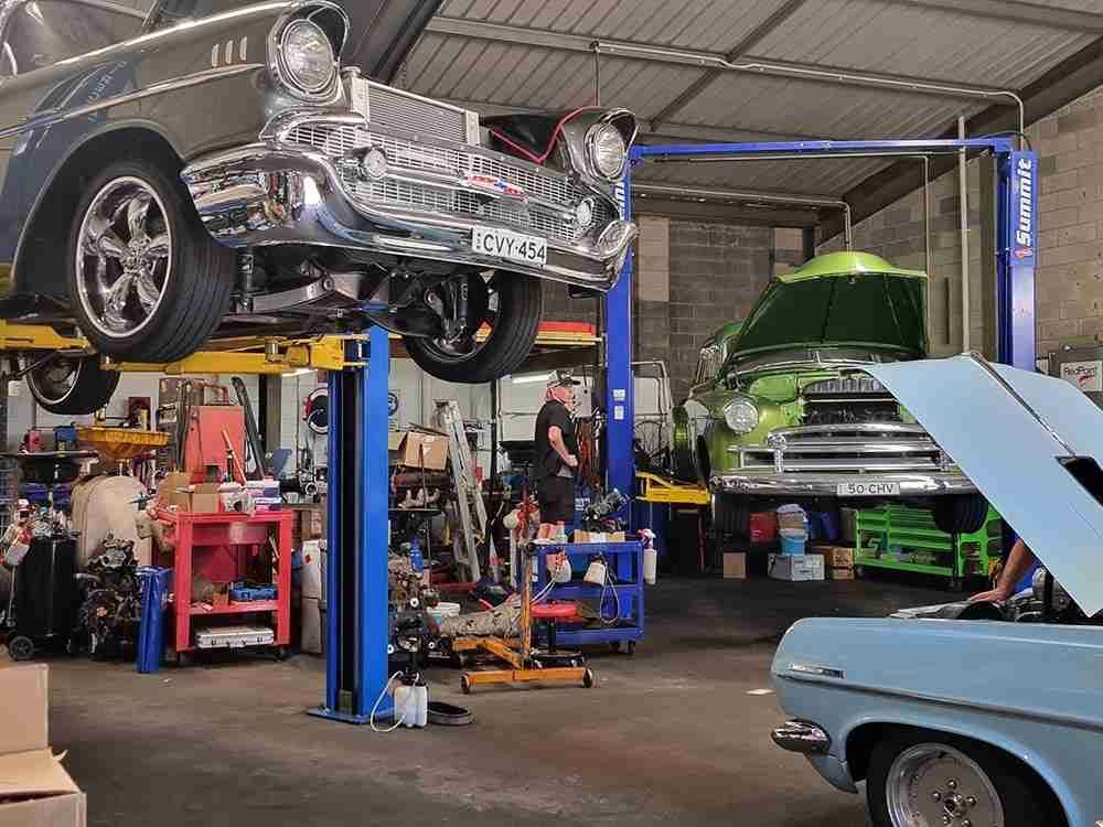 A Man is Working on a Car in a Garage — AA Automotive Repairs in Forster, NSW