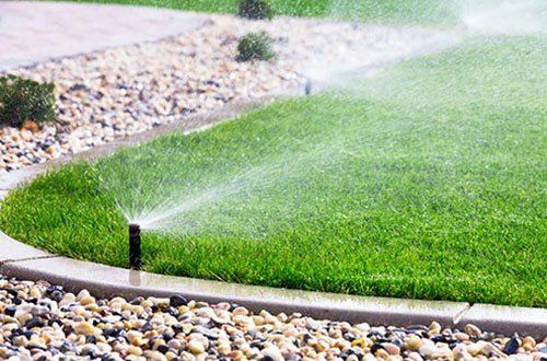 Automatic Sprinklers Watering Lawn — Greer, SC — Smith Irrigation & Landscaping