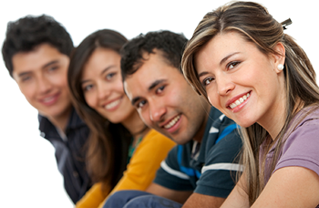Group of four smiling young adults.
