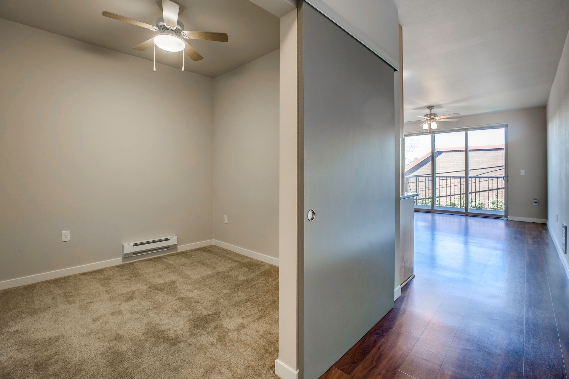 bedroom with ceiling fan and carpet