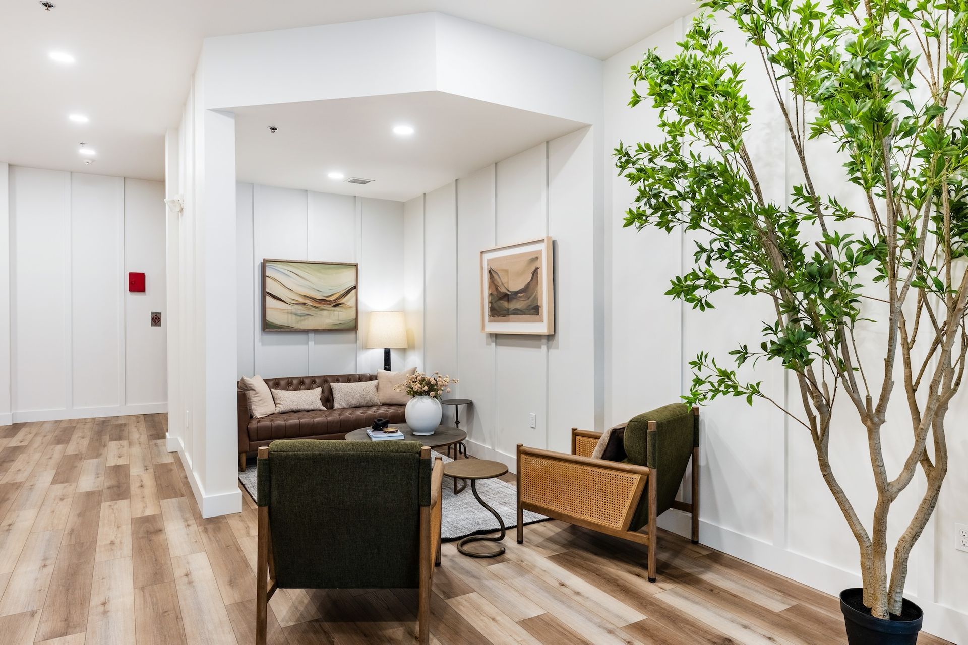 lobby area with seating and a plant