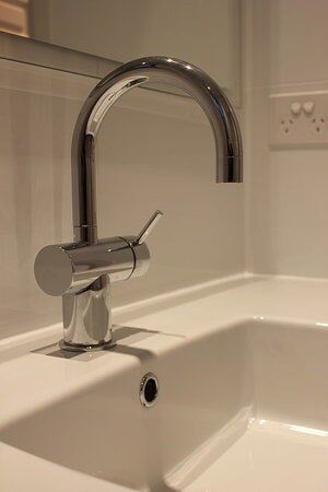 Bathroom Sink with Stainless Tap — Builders  in Fernhill, NSW