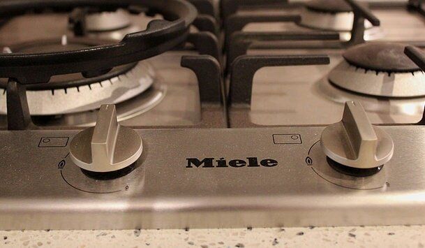 Miele Gas Stove Top — Builders  in Fernhill, NSW