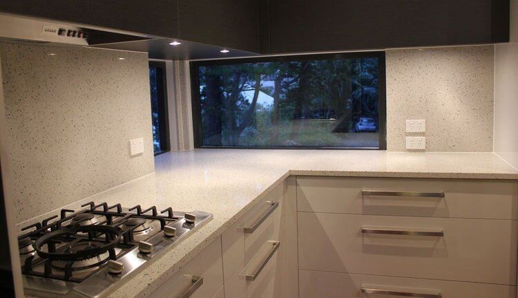 Large White Kitchen Bench — Builders  in Fernhill, NSW