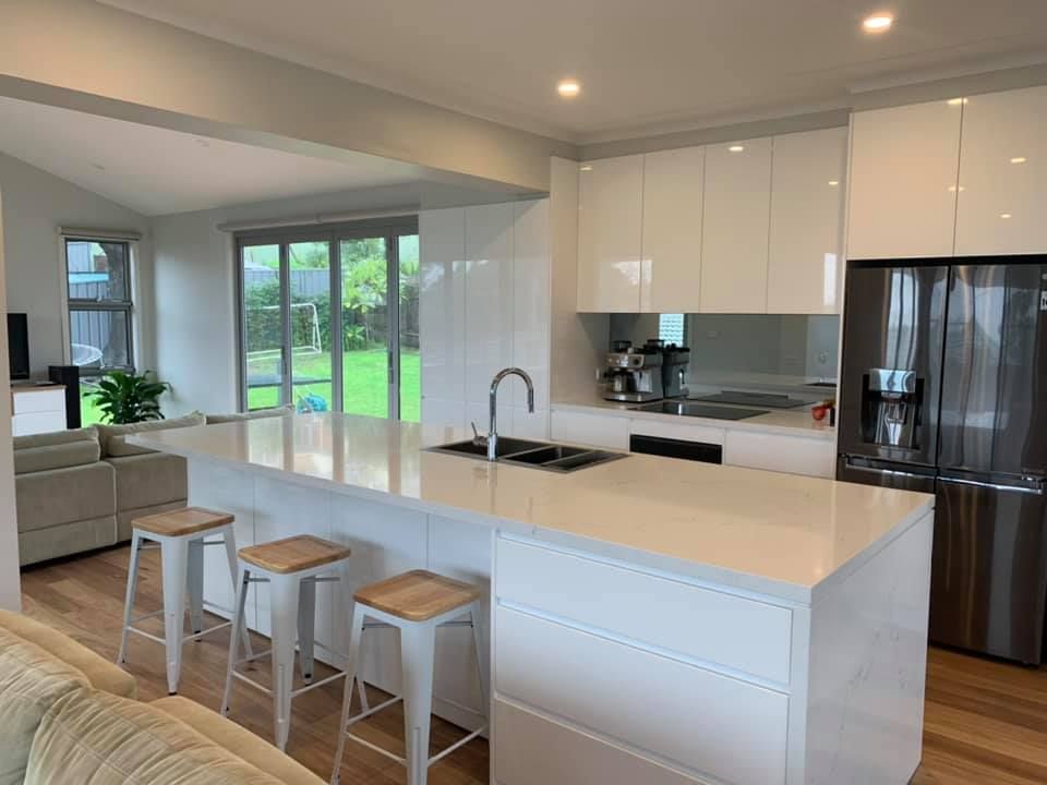 A Kitchen With White Cabinets — Craig Allman Construction Pty Ltd In Fernhill, NSW