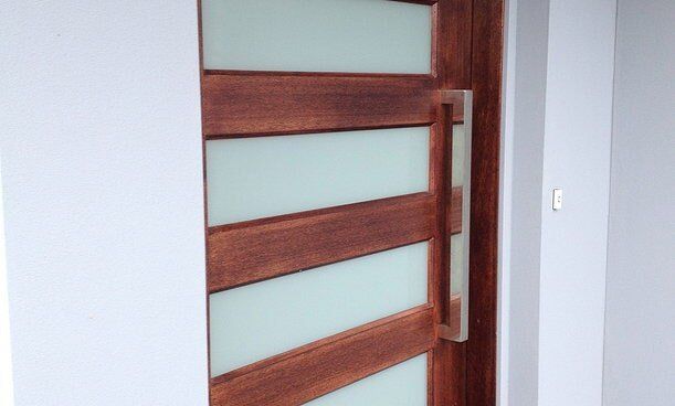 Wooden Door — Builders  in Fernhill, NSW