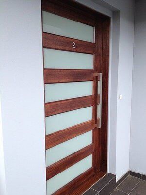 Wooden Front Door — Builders  in Fernhill, NSW