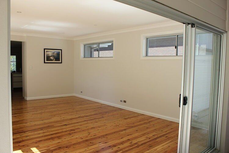 Empty Living Room — Builders  in Fernhill, NSW