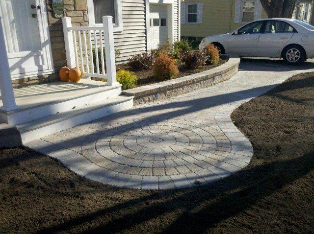 Front walkway design with bricks - front yard landscaping services - Stellato Bros. Inc. in Feeding Hills, MA