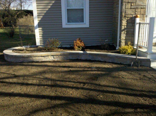 Front walkway retainer wall design - front yard landscaping services - Stellato Bros. Inc. in Feeding Hills, MA