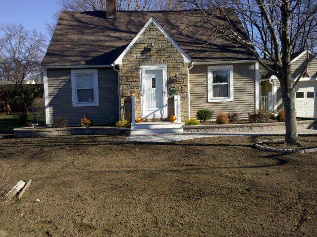 Front walkway design to entrance door - front yard landscaping services - Stellato Bros. Inc. in Feeding Hills, MA