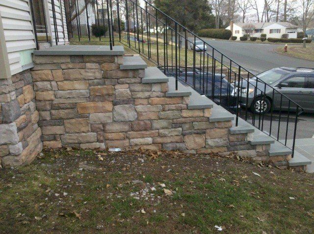 Brick and Stone stair walkway to front door - front yard landscaping services - Stellato Bros. Inc. in Feeding Hills, MA