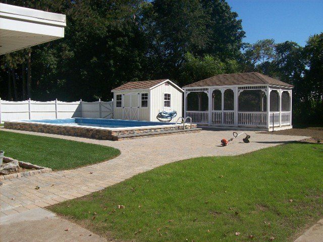 Back yard brick walkway - back yard landscaping services - Stellato Bros. Inc. in Feeding Hills, MA