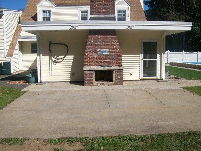 Back yard brick walkway - back yard landscaping services - Stellato Bros. Inc. in Feeding Hills, MA