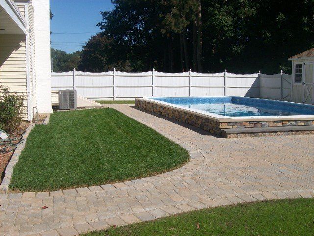Back yard brick walkway - back yard landscaping services - Stellato Bros. Inc. in Feeding Hills, MA