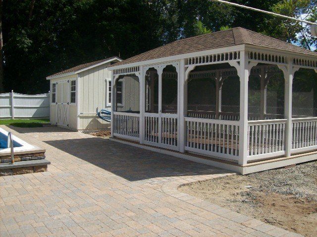 Back yard brick walkway - back yard landscaping services - Stellato Bros. Inc. in Feeding Hills, MA