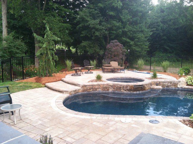 Back yard brick walkway - back yard landscaping services - Stellato Bros. Inc. in Feeding Hills, MA
