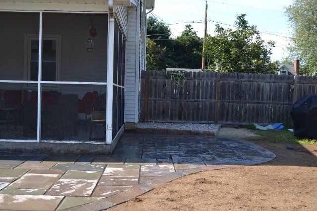 Back yard brick walkway - back yard landscaping services - Stellato Bros. Inc. in Feeding Hills, MA