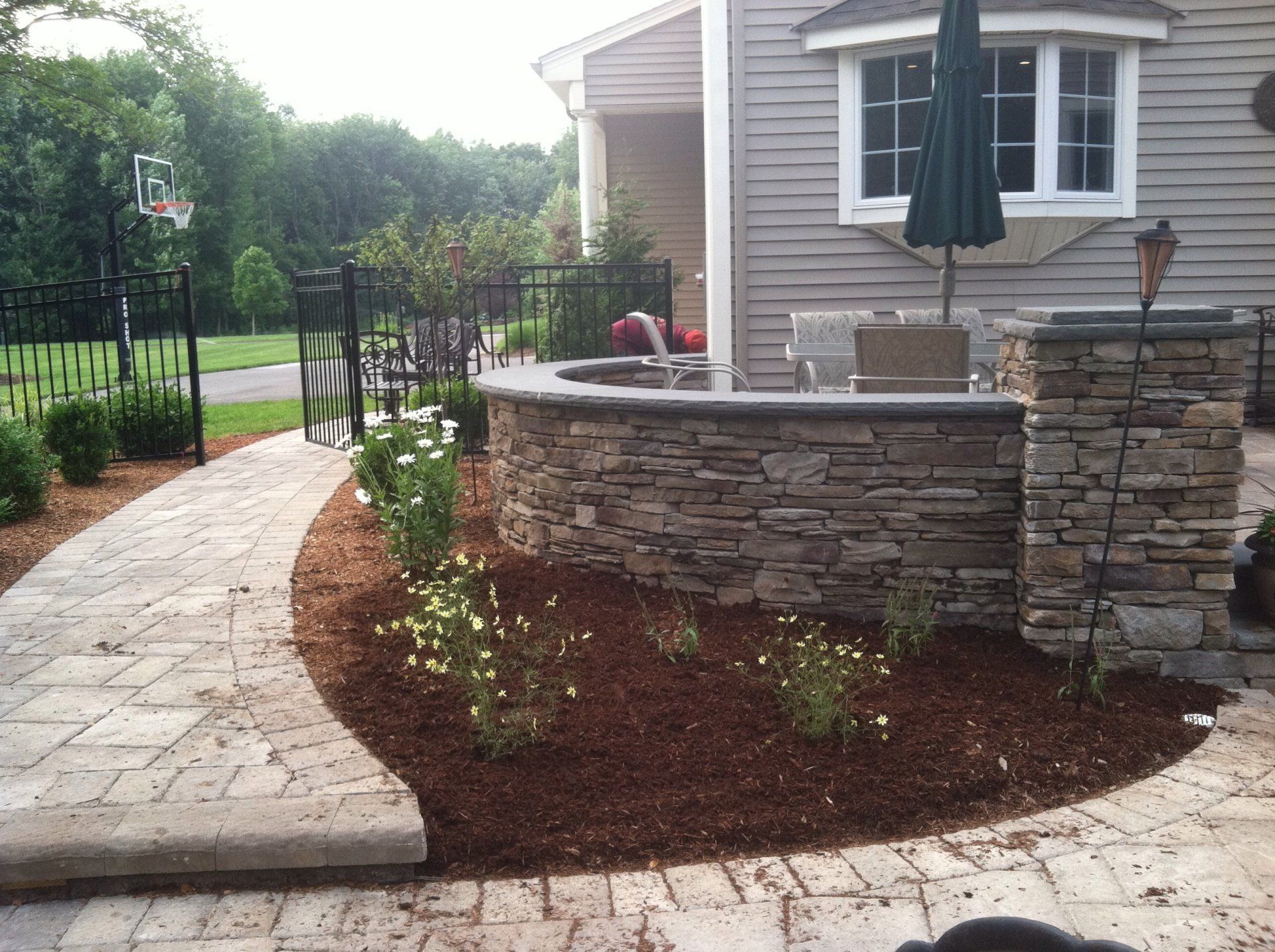 Brick and stone walkway and patio design - brick pavers, walkways and patios landscaping services - Stellato Bros. Inc. in Feeding Hills, MA