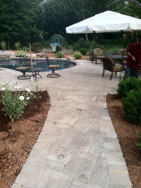 Brick and stone walkway and patio design - brick pavers, walkways and patios landscaping services - Stellato Bros. Inc. in Feeding Hills, MA