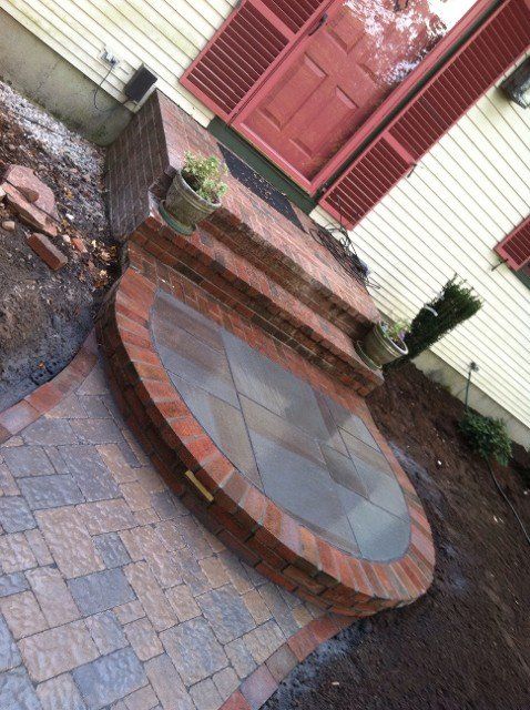Brick and stone walkway with stairs - brick pavers, walkways and patios landscaping services - Stellato Bros. Inc. in Feeding Hills, MA