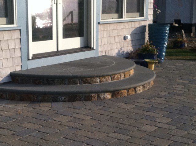 Brick and stone walkway with stairs to doorway - brick pavers, walkways and patios landscaping services - Stellato Bros. Inc. in Feeding Hills, MA