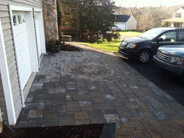 Brick and stone walkway - brick pavers, walkways and patios landscaping services - Stellato Bros. Inc. in Feeding Hills, MA