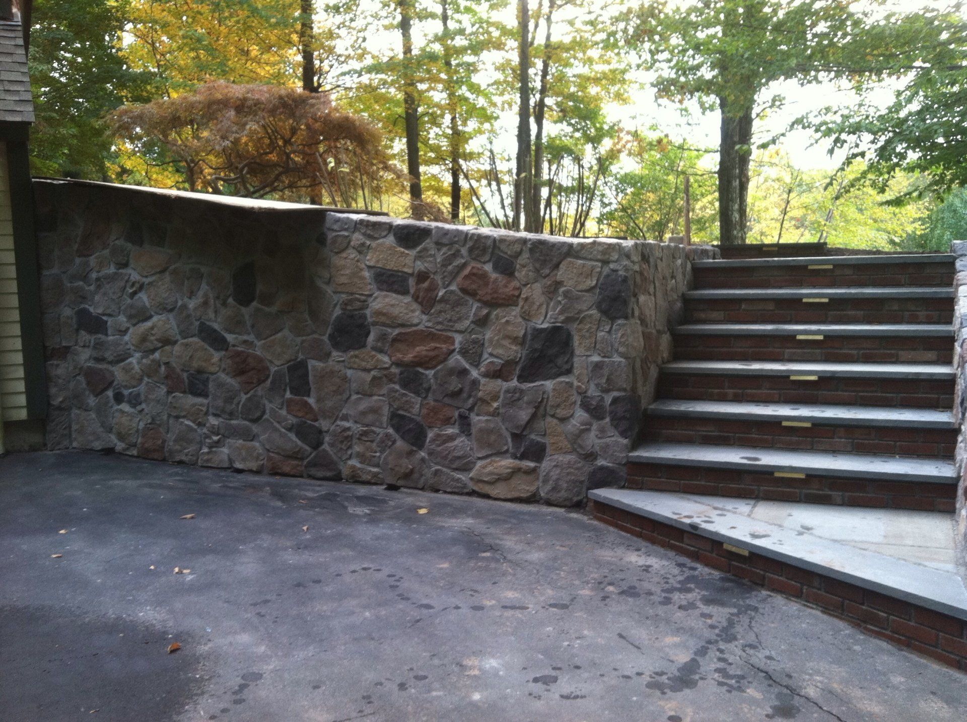 Brick and stone walkway and patio design - brick pavers, walkways and patios landscaping services - Stellato Bros. Inc. in Feeding Hills, MA