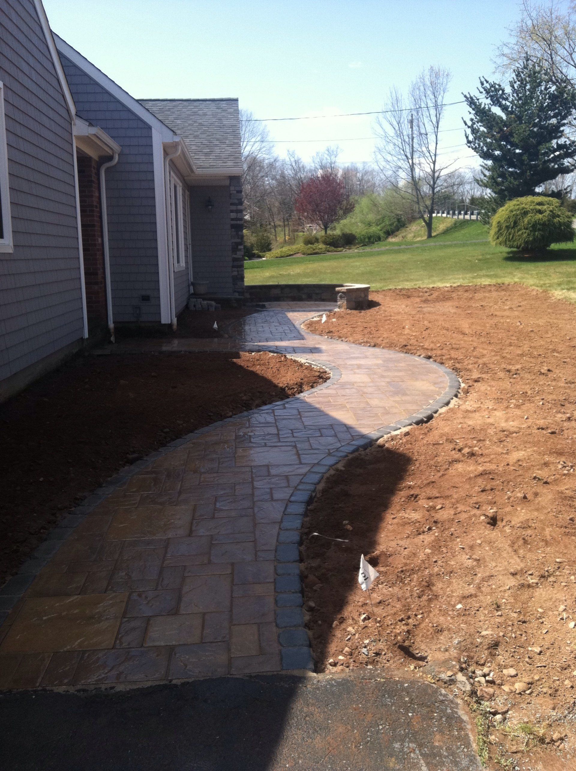 Brick and stone walkway and patio design - brick pavers, walkways and patios landscaping services - Stellato Bros. Inc. in Feeding Hills, MA